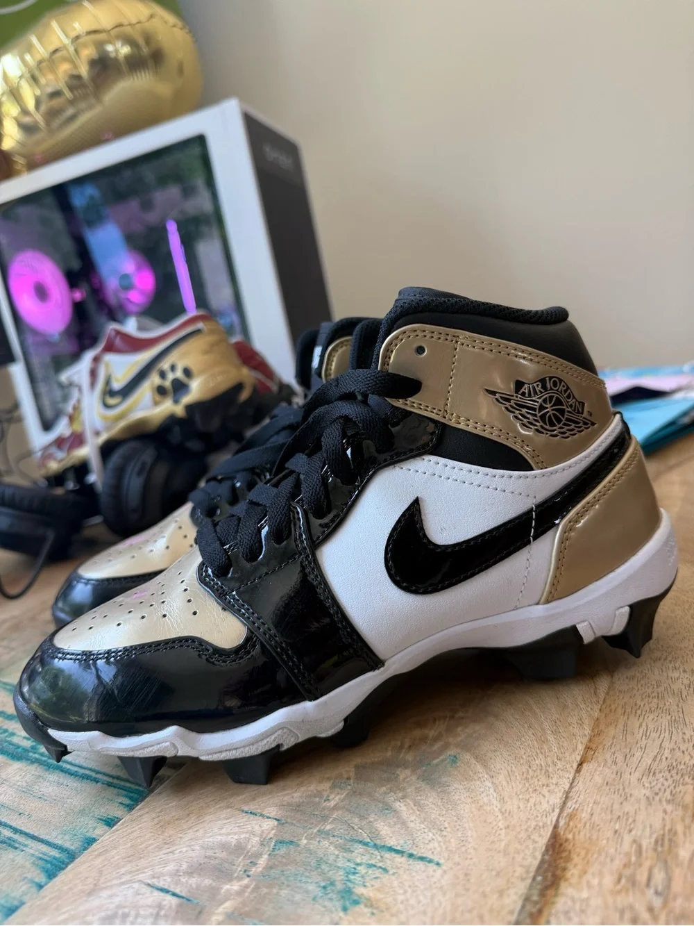 Air Jordan Cleats in Black, White & Gold